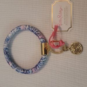 Lilly Pulitzer Round Keychain featuring  "Shade Seekers"